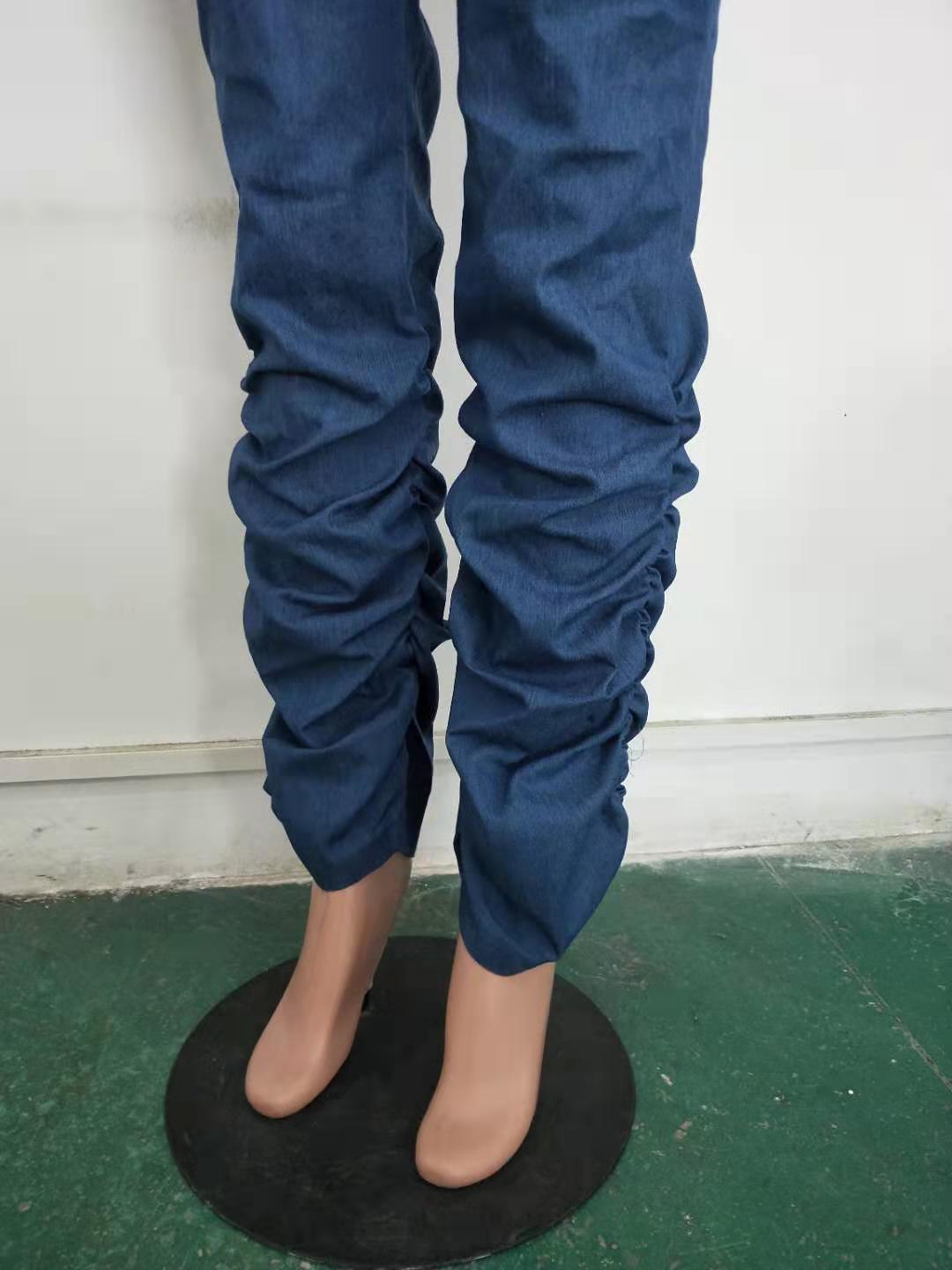 Classic pile of denim trousers